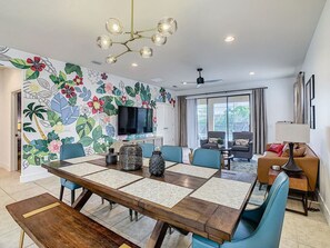Spacious open dining room just steps from the comfortable living room.