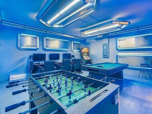 Enjoy nonstop fun in the game room—complete with billiards, a gaming computer, and a classic foosball table for friendly competition!