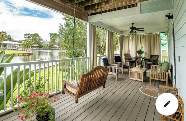 Private Porch over looking The Choctawatchee Bay . 