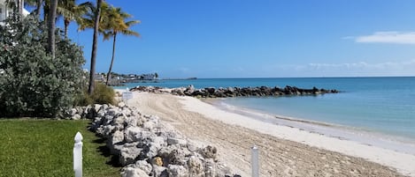 Private sandy beach for you to enjoy! It's fun to snorkel around the jetty.