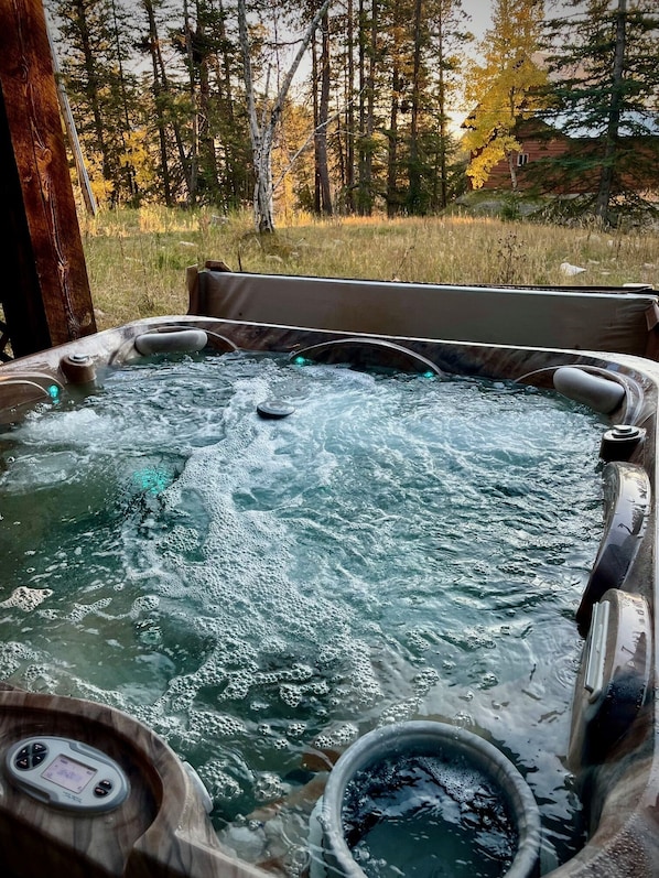 Relax after a busy day of adventure in the soothing hot tub.