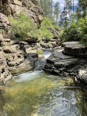 Hike Devil's Bathtub in Spearfish Canyon for an unforgettable experience.  There's not a bad view anywhere.