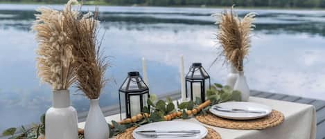 Luxury Picnic on the water - decor, eatery and candles provided ©