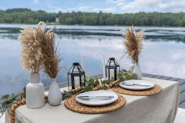 Luxury Picnic on the water - decor, eatery and candles provided ©