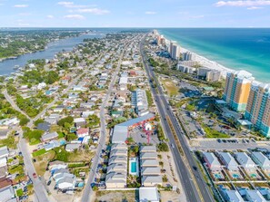 Thomas Drive area between the lagoon and the beautiful Gulf of Mexico aerial.