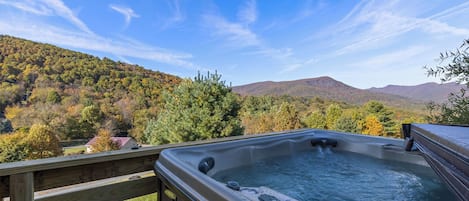 Relax in the hot tub as you enjoy the mountain views.