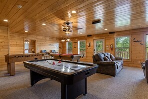 Game Room - Pool Table, Air Hockey, Foosball, and Additional Seating Area with TV - Ground Floor