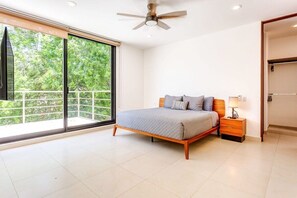 Spacious primary suite with king bed and ensuite bathroom & balcony access