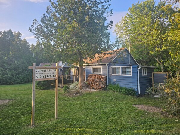 The roadside view complete with our cottage rentals sign.