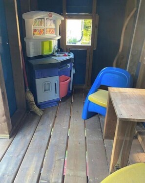 Toy kitchenette, table and chair and stove to cook diner!! 