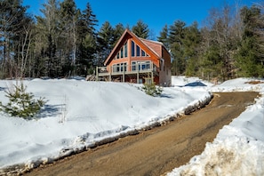 Welcome home! A spacious driveway awaits, offering ample parking for 7-8 cars.