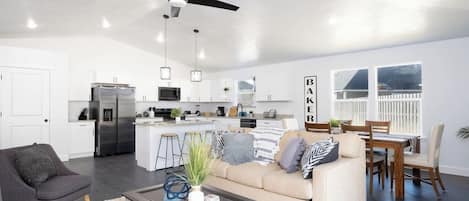 Beautiful and bright open plan with kitchen, living and dining area. Enjoy all of the Florida sunshine from inside this comfortable and beautifully decorated home.