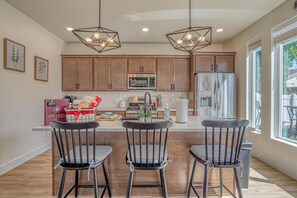 Enjoy cooking in a kitchen that blends functionality with modern design.