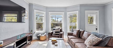 Tons of natural light in the living room with ample seating! 