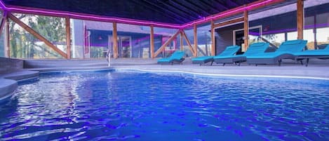 Indoor Pool and lots of seating. The pool is heated thru the Winter.