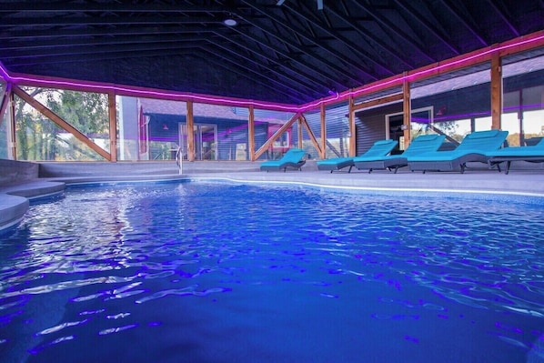 Indoor Pool and lots of seating. The pool is heated thru the Winter.