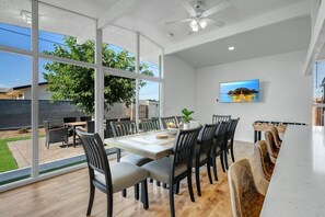 Kitchen with glass walls for visual splendor, high ceilings & entertainment