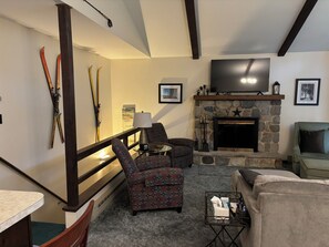 Staircase to lower level and main living area
