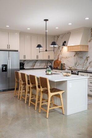 Seating for 4 at the kitchen island. 