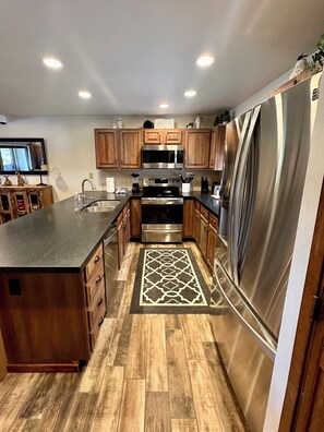 Stainless steel appliances and great prep space