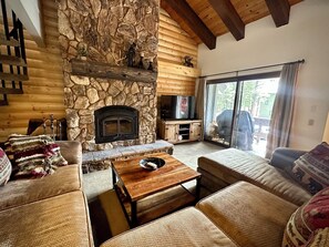 Wood burning fireplace, comfortable sofa