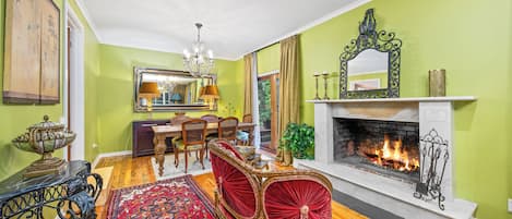 Large fire place with French 2 seater lovers couch