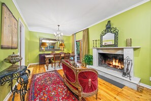 Large fire place with French 2 seater lovers couch