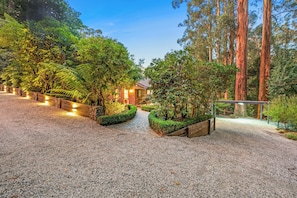 Gorgeous automatic lighting at dusk magnifying the beauty of the gardens