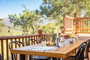 Stunning outdoor dining area looking out over the mountains.