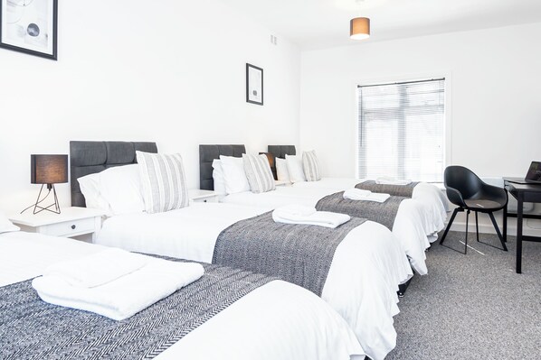 This room offers the flexibility of four single beds that can be easily converted into 2 double-bed. Please let us know in advance if you'd like to make this arrangement.