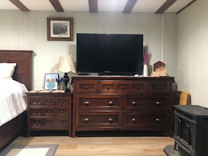 Large screen TV and ample drawer space for your use