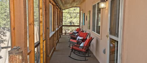 Screened Porch with Rocking Chairs