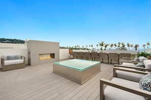 Panoramic view deck with linear fireplace