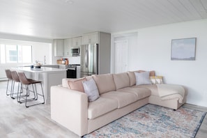 The open, spacious first floor is perfect for gathering with your crew.