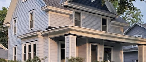 Come home each day to a beautifully restored 1910s Colonial, one of the prettiest houses on the block