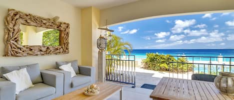 oceanfront terrace with comfortable lounge chairs