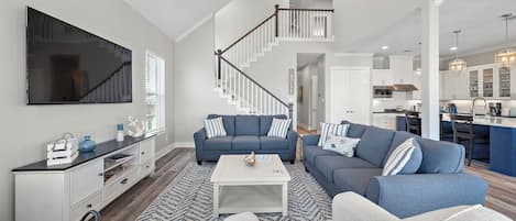 Relax and enjoy the beachy vibe in this spacious living room!