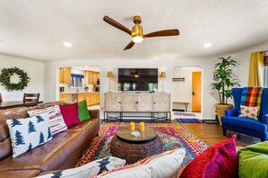 Vibrant Living Room with large windows and natural light!