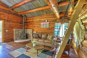 Living Room with steep loft stairs