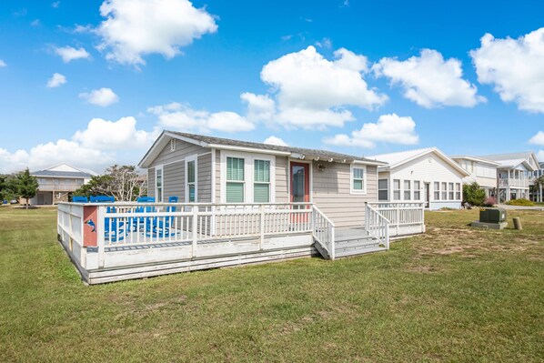 Located on 2622 E. Dolphin Dr., the Cutouts on the Porch Railing are a Reminder that you will be Vacationing where the Dolphins Play.
