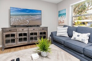 Living Room with Two Queen Size Sofas (one is a sleeper sofa) and Smart TV