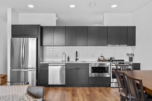 Fully Stocked Kitchen with Dining Table