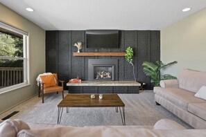 Our cozy living room is the perfect spot to relax and unwind during your stay