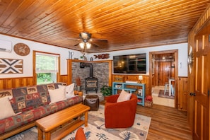 Spacious living refinished living room with original cabin details!