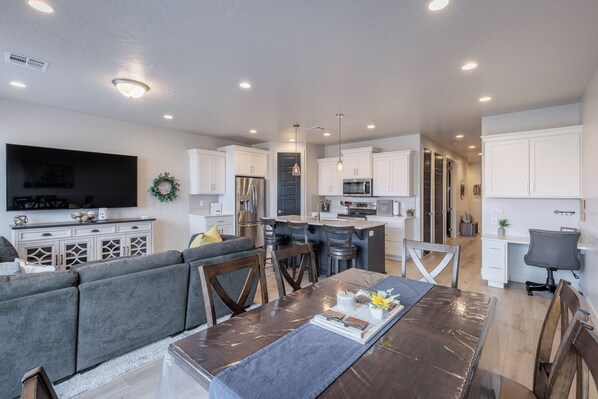 Dining Area Side View - Share memories and stories while enjoying a family style meal around the Dining Table.