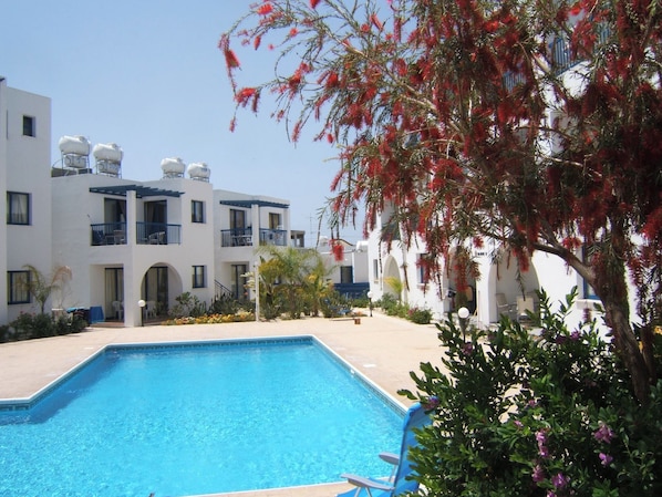 Relax by the pool private sunbeds and beach chairs provided