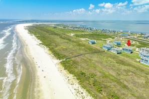 West-facing view of miles of open beach