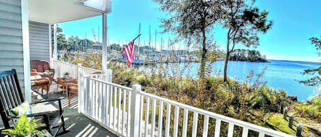 Relax on our porch adorned with rocking chairs.