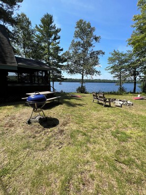 Private yard, firepit, charcoal grill, picnic table, horseshoes, and corn hole. 