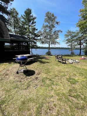 Private yard, firepit, charcoal grill, picnic table, horseshoes, and corn hole.